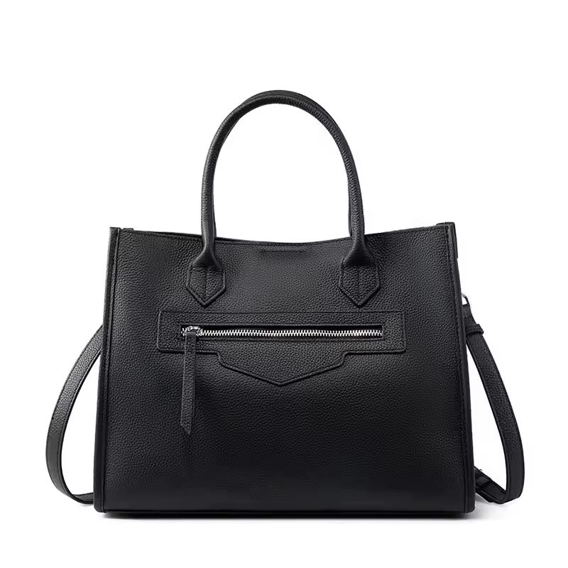 Bolsa Olívia em couro legítimo, tote grande e elegante. Espaçosa, com divisórias, fecho duplo e alças para usar na mão ou no modelo transversal.