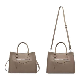 Bolsa Olívia em couro legítimo, tote grande e elegante. Espaçosa, com divisórias, fecho duplo e alças para usar na mão ou no modelo transversal.