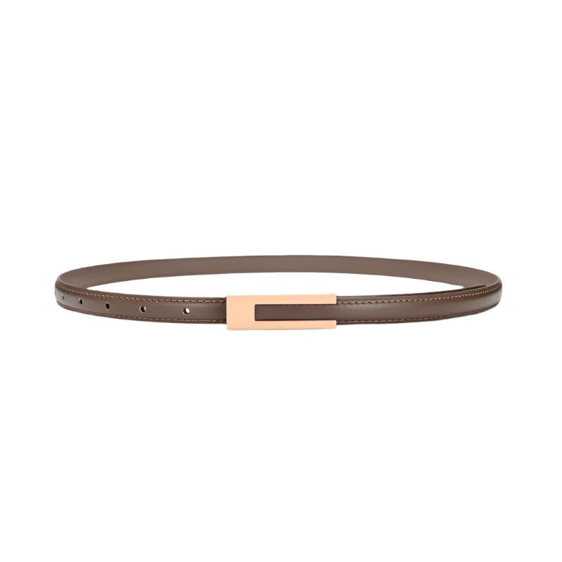 Cinto Raquel em couro legítimo, 1,5 cm de largura e 105 cm de comprimento. Minimalista e sofisticado, com fecho moderno e toque de elegância discreta.