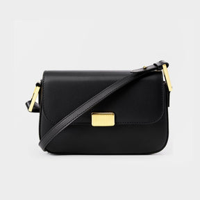 Bolsa Jack em couro legítimo, compacta e moderna. Modelo box bag com botão de encaixe e bolsos internos, une praticidade, estilo e organização no dia a dia.