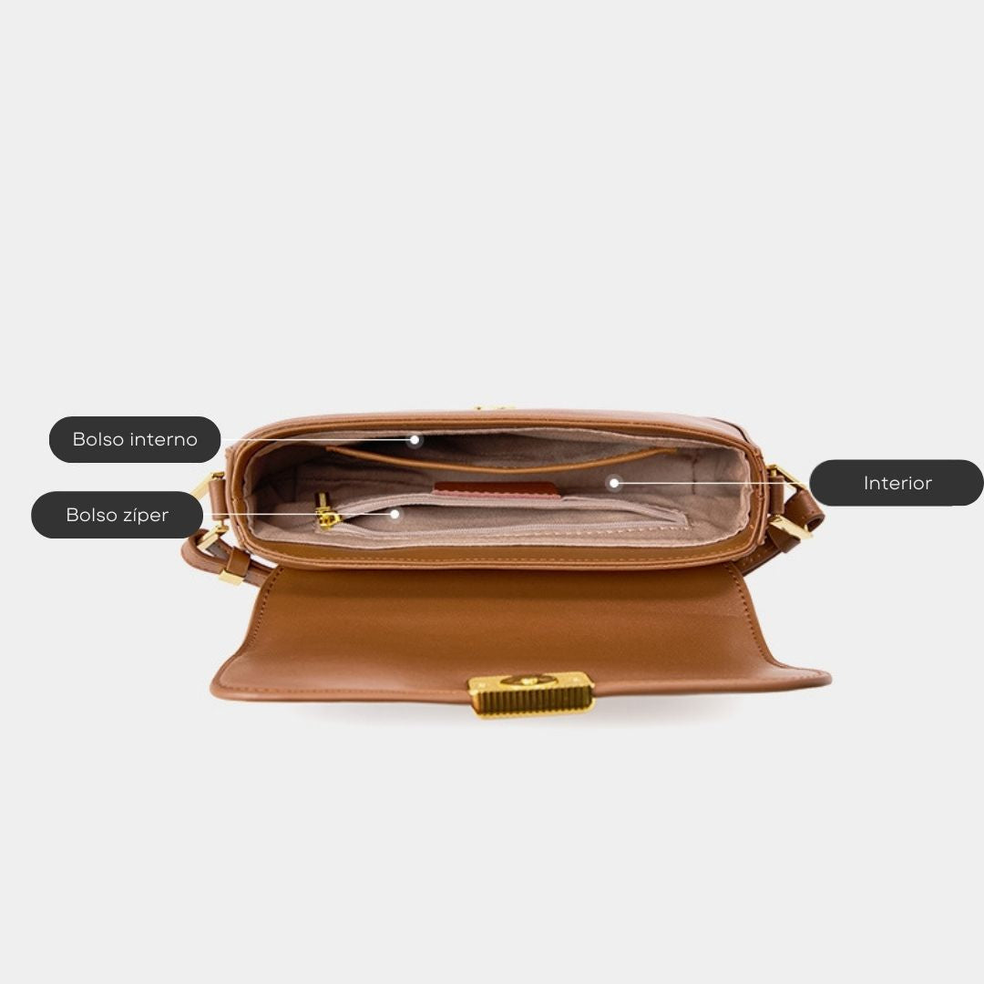 Bolsa Jack em couro legítimo, compacta e moderna. Modelo box bag com botão de encaixe e bolsos internos, une praticidade, estilo e organização no dia a dia.