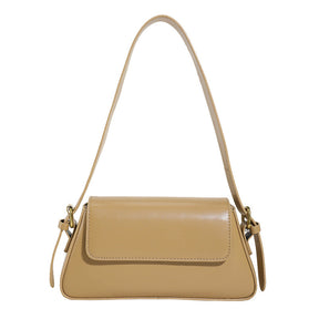 Bolsa Mila baguete em material sintético premium, elegante e moderna. Design estruturado, textura delicada e alça de ombro para looks versáteis.