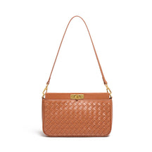 Bolsa Priscila estilo baguette com acabamento trançado. Compacta, elegante e moderna, ideal para o verão e perfeita para eventos ou passeios casuais.