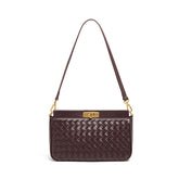 Bolsa Priscila estilo baguette com acabamento trançado. Compacta, elegante e moderna, ideal para o verão e perfeita para eventos ou passeios casuais.